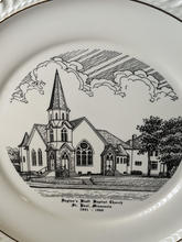 Souvenir serving plate showing a sketch of a Gothic church with a corner tower and steeple. 
